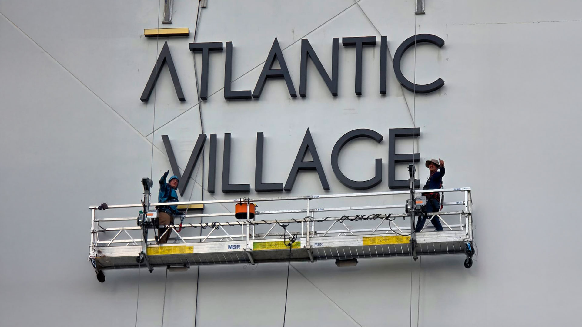 Business sign being installed with permit in Miami, Florida